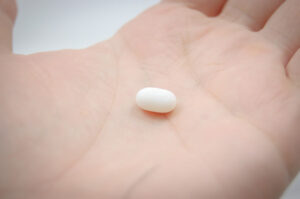 Image of a tablet in the palm of a hand