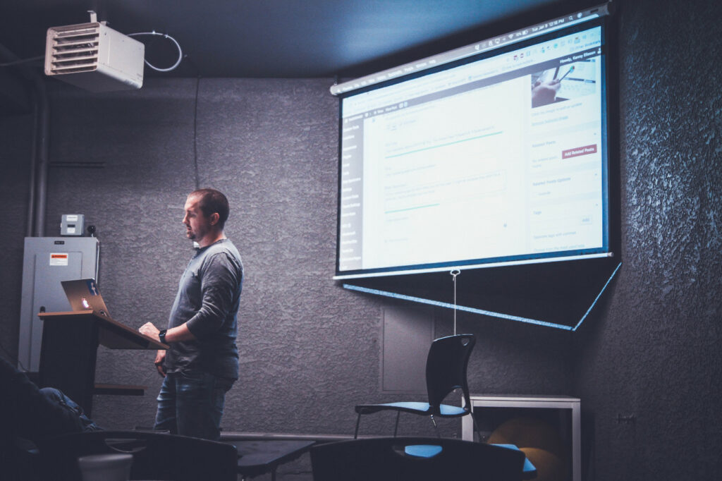 ISPC Polygraph Training - Instructor in front of white projector board