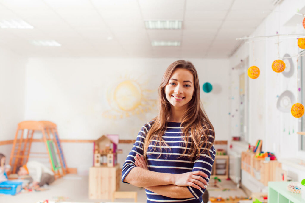 Image of a young female teacher in a classroom